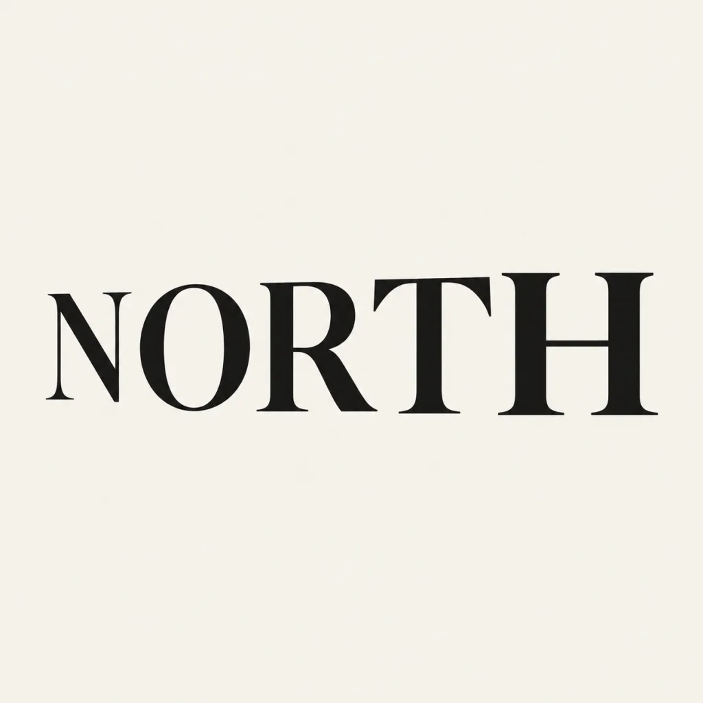 NORTH in confident black serif lettering with generous spacing on warm ivory